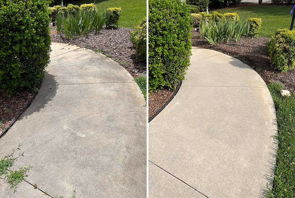 Side-by-side comparison of a concrete sidewalk before and after pressure washing, showing a cleaner and brighter surface on the right.